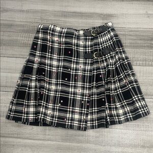 Chic Black and White Plaid Mini Skirt with Buckle Accents